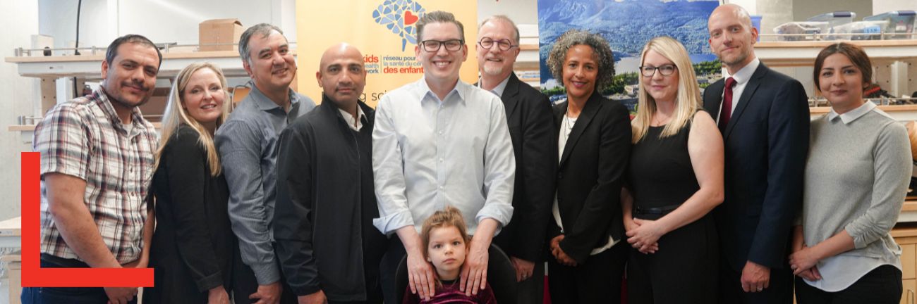 A team of researchers and staff from KBHN pose with Minister Beech and Minister Bains.